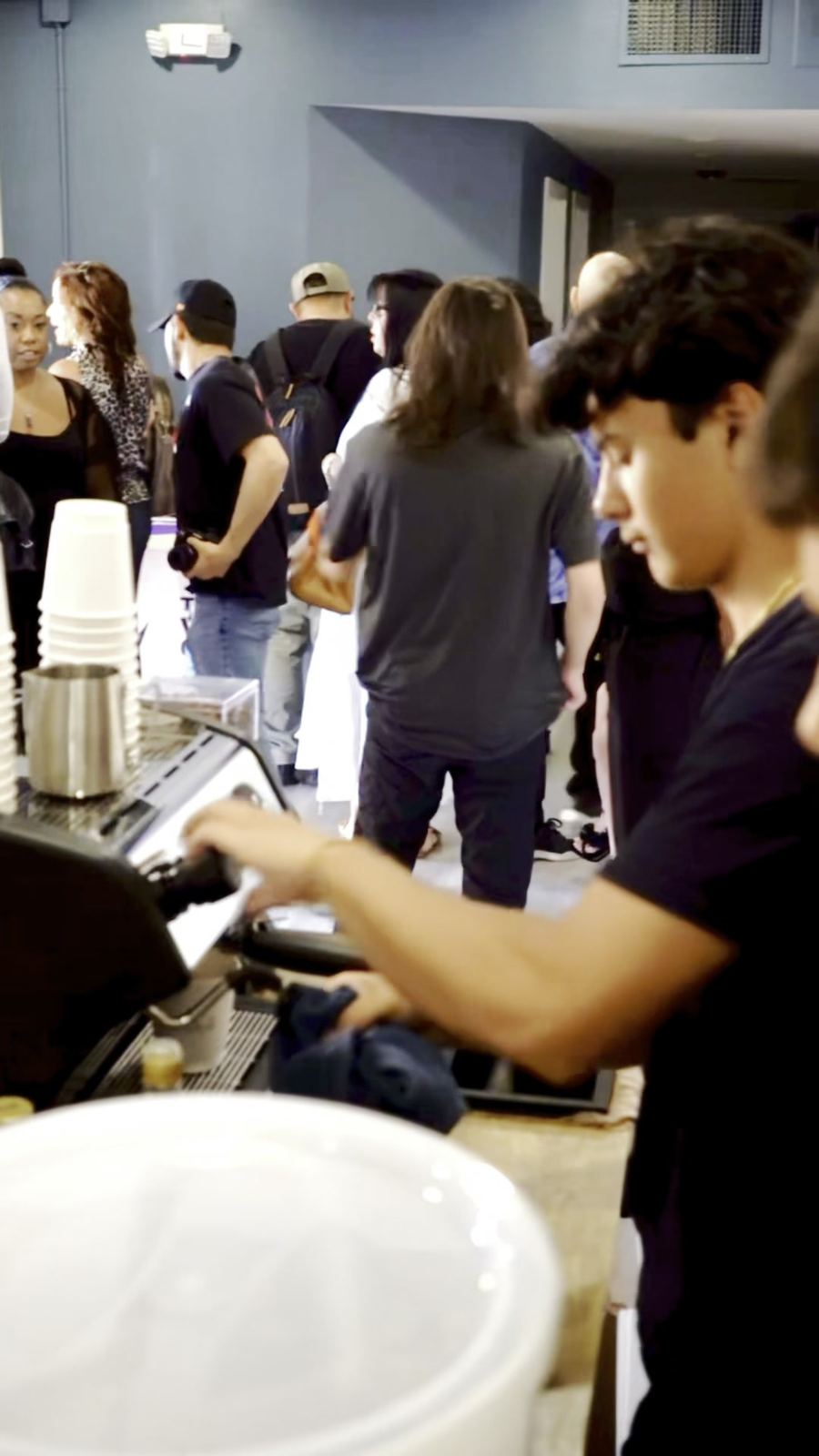Guests lining up at the Bloom coffee cart