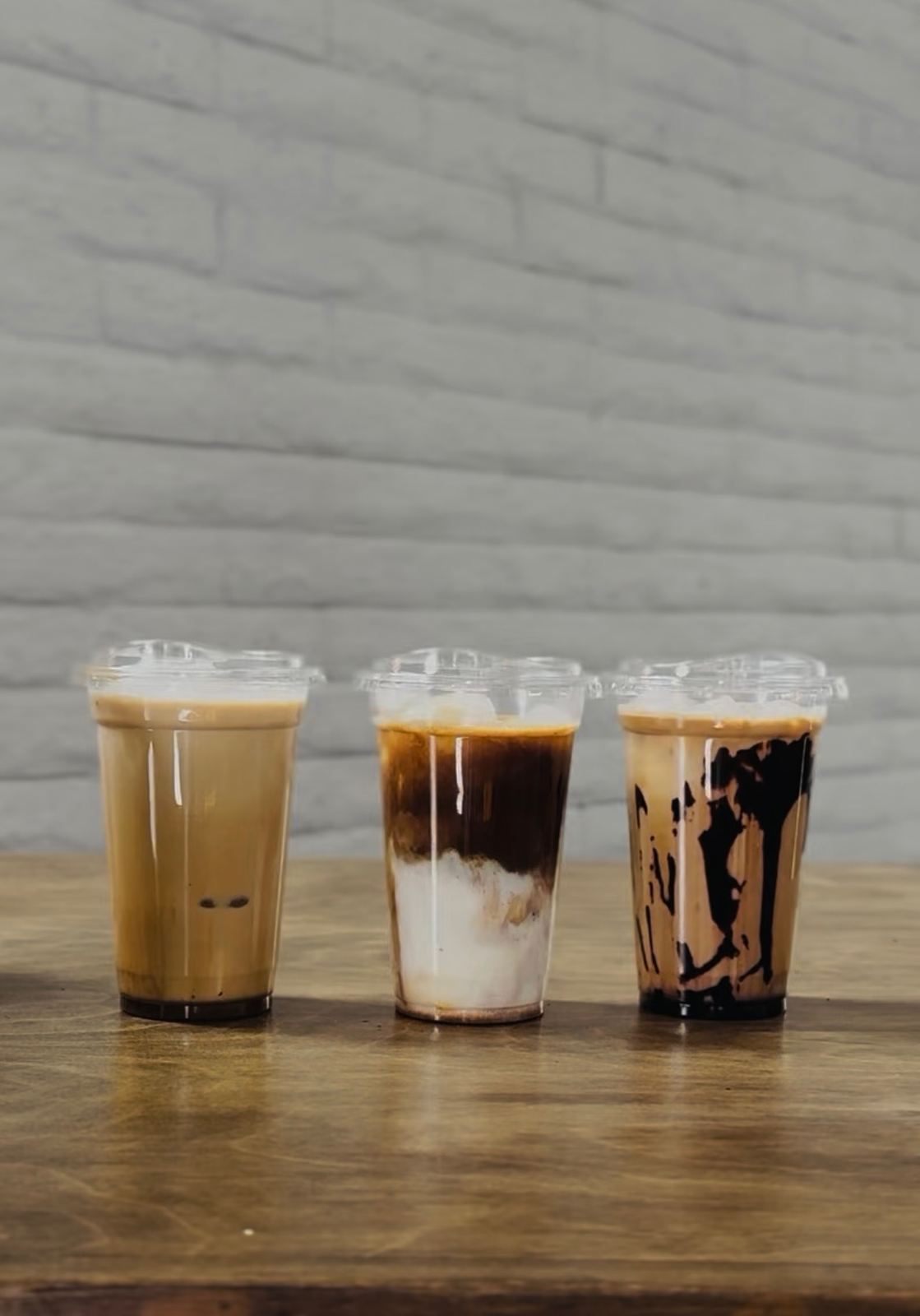 Three iced coffee drinks from Bloom Coffee Roasters